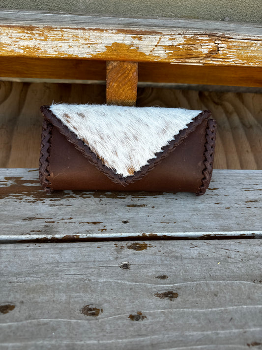 Brown cowhide clutch